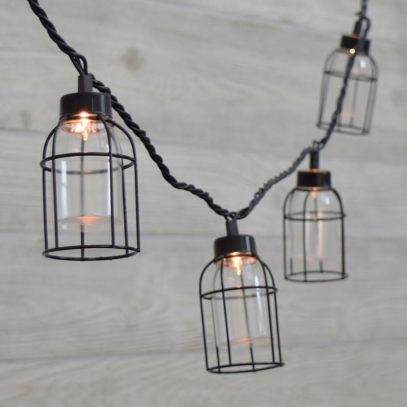 caged lighting. vintage style edison cage string lights caged lighting